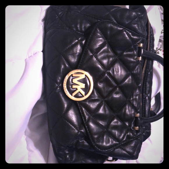 Michael Kors Handbags - MK purse for sell real leather good condition